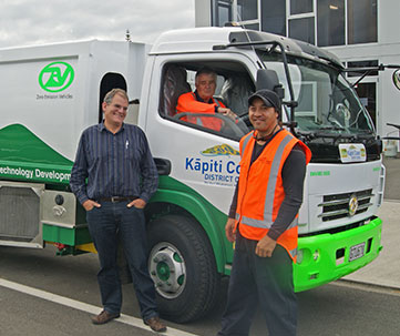 Electric truck with drivers and ZEV managing director.